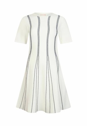 White short-sleeve knee-length dress with flared skirt and vertical black dashed stripes evenly spaced down the front.