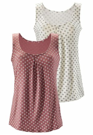 Es sind zwei Tanktops zu sehen: eines in einer Rosafarbe mit einem geometrischen weißen Muster und eines in Creme mit einem dezenten grauen Muster. Beide haben einen runden Ausschnitt.