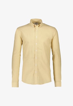 Chemise jaune à manches longues en lin, dotée d'un col boutonné et de boutons blancs le long de l'avant, avec une texture lisse.
