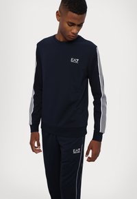 EA7 Emporio Armani PANTALONI - Träningsbyxor - blue