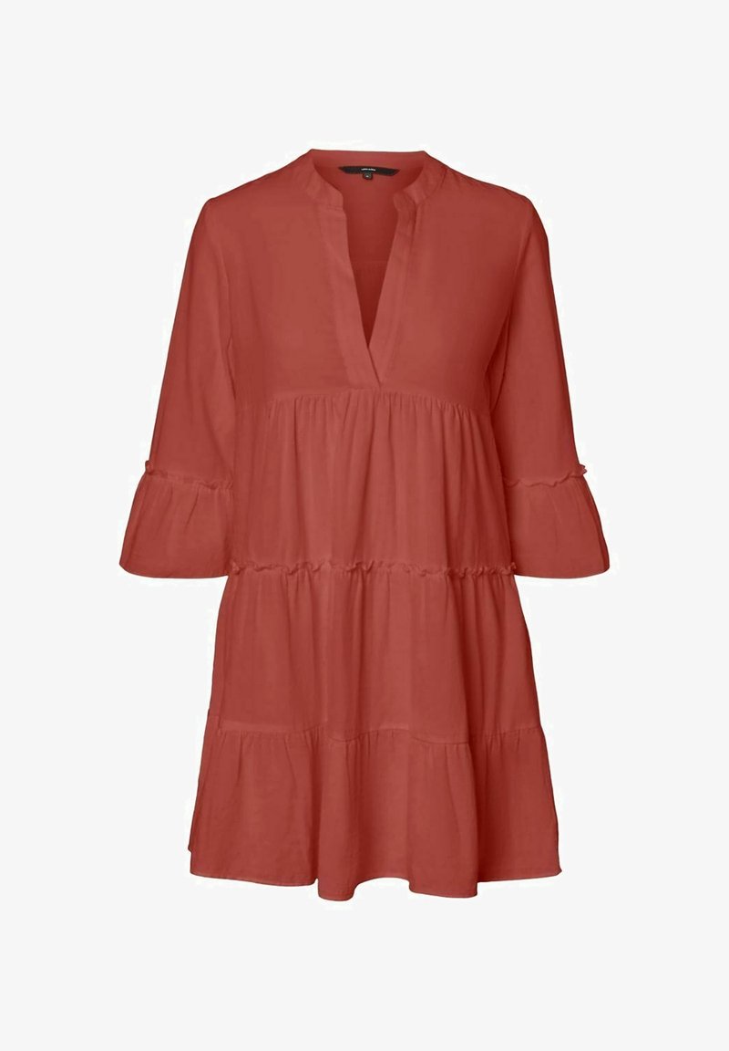 Rust-colored dress in lightweight fabric, featuring a V-neck, three-quarter bell sleeves, and a tiered hem for added volume.