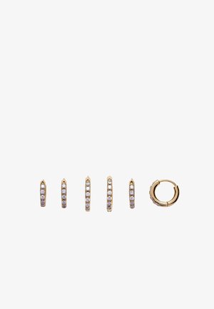 Six gold hoop earrings in small, medium, and large sizes, each adorned with a row of clear round gemstones.