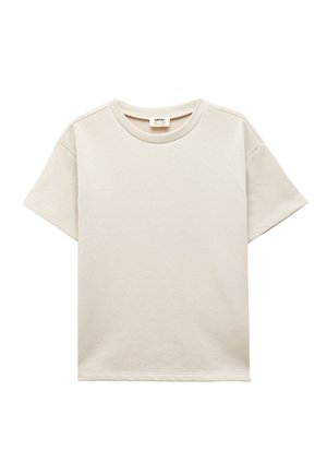 Jasno beżowy t-shirt z krótkim rękawem, okrągłym dekoltem, miękką teksturą i minimalistycznym wzornictwem. Idealny do codziennego noszenia.