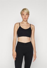 Yogasearcher SAMSKARA - Sujetadores deportivos con sujeción ligera - black