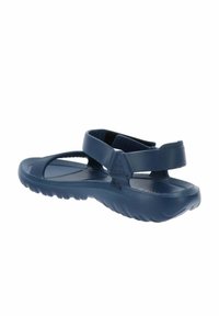 Chanclas de goma azules con una superficie suave, que cuentan con dos correas ajustables para un ajuste seguro y una suela texturizada para mayor tracción.