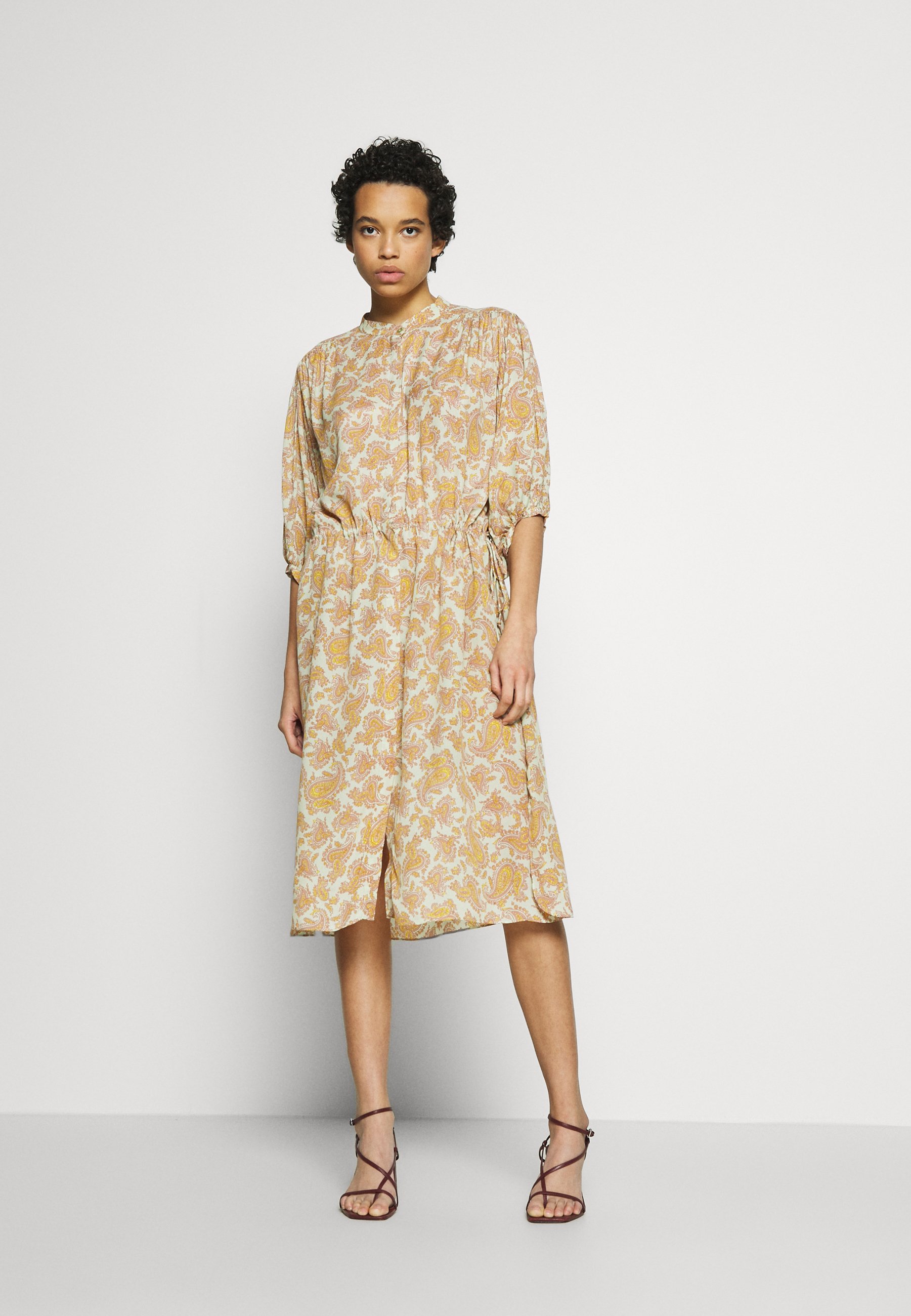 second female yellow dress