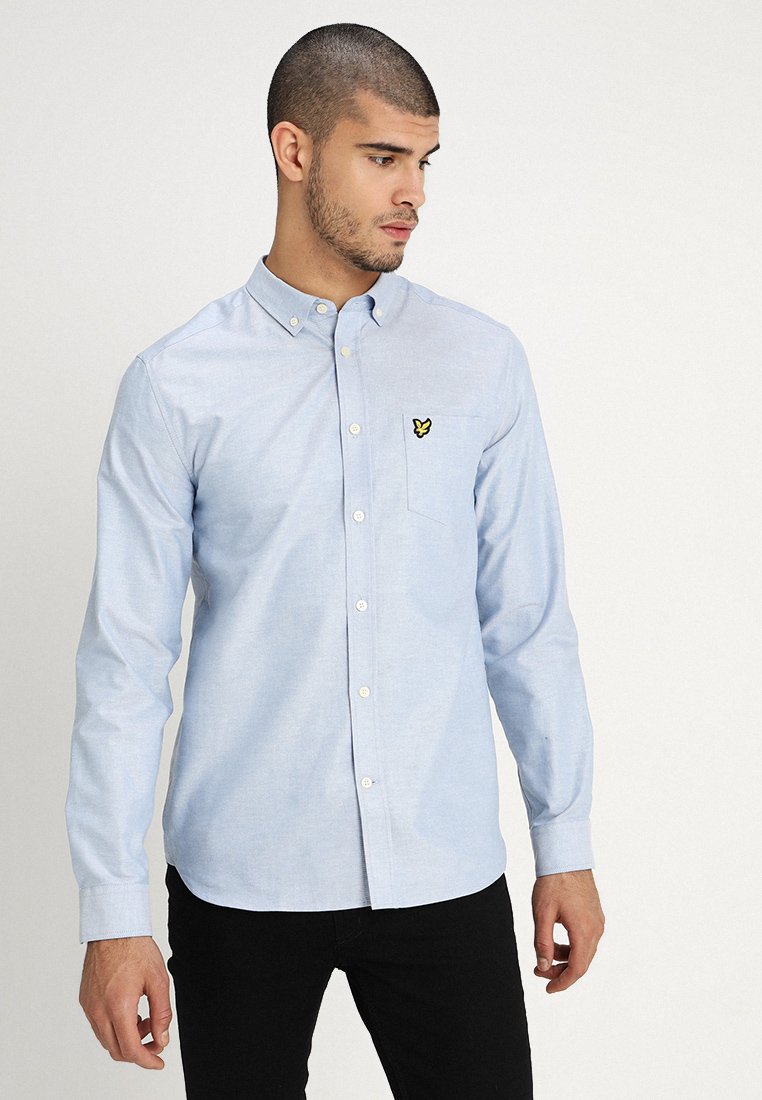 Skjorter | Herre | Kjøp klær på nett hos Zalando Krageløs skjorte Regular fit. Sort HERRE | H&M NO