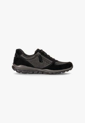 Black athletic shoes featuring a mix of textured suede and smooth leather, with a zip closure, flexible sole, and cushioned midsole for comfort.