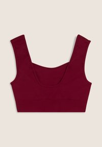 Bralette bordeaux con spalline larghe, scollatura rotonda e texture liscia. Presenta un design aderente con cuciture sottili.