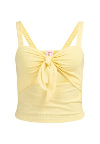 Keltainen ribbikuvioinen crop-top, jossa on solmittu etuosa ja säädettävät tuplahihnat. Ominaisuuksiin kuuluu istuva muotoilu ja pehmeä rakenne.
