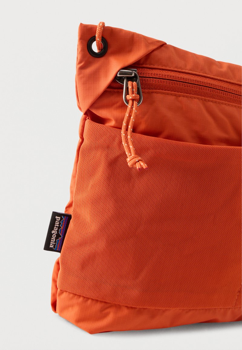 cross bag patagonia Atom Sling 8L Crossbody Unisex Backpack D spacer mesh pads the shoulder strap and back panel to wick moisture Patagonia's 'Small but Mighty' Crossbody