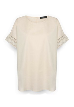 Blusa beige a maniche corte con scollo rotondo e rifinitura in pizzo sulle maniche, fronte semplice e chiusura con zip sul retro.