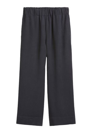 Pantalons larges bleu marine foncé avec une taille élastique, fabriqués à partir d'un tissu doux et lisse, avec un ourlet droit et sans motifs visibles.