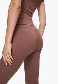 Bershka Tygbyxor - orange