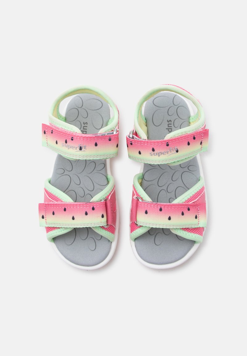 Children's open-toe sandals with pink and green watermelon-patterned straps and gray cushioned insoles with floral design.