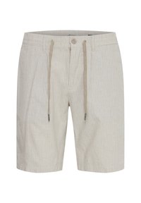 Lyse beige shorts laget av vevd stoff, med hvite vertikale striper, knappelukking og snor i livet.