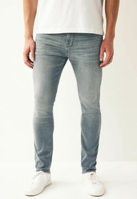 Next SUPER STRETCH COMFORT - Traperice ravnih nogavica - light blue