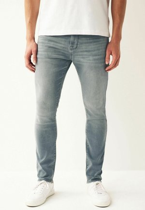 Next SUPER STRETCH COMFORT - Sirgete säärtega teksad - light blue