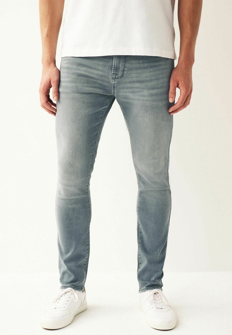 Next SUPER STRETCH COMFORT - Traperice ravnih nogavica - light blue