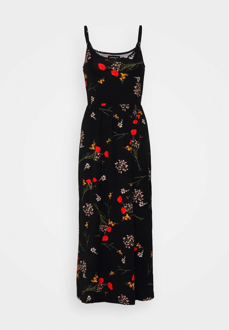 Musta maksimekko, jossa on kukkakuvioita punaisena, keltaisena ja vaaleanpunaisena. Ominaisuuksiin kuuluu ohuet olkaimet, istuva vyötärö ja laskeutuva helma. Valmistettu puuvillasta.