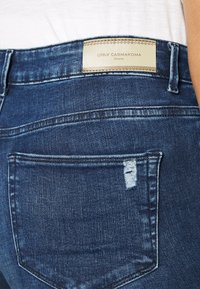 ONLY Carmakoma CARWILLY LIFE - Jeans Skinny - dark blue denim