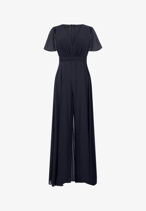 Mørkeblå jumpsuit med korte flæseærmer, V-udskæring, figursyet talje, bukser med vide ben og lynlås bagpå.