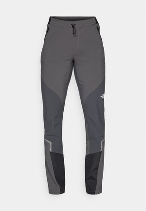 Pantalons de randonnée gris avec une coupe fuselée, plusieurs poches et des accents noirs et gris foncé contrastants. Fabriqués en un matériau flexible et durable.