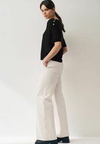 Next V-NECK GEM - Printtipaita - black