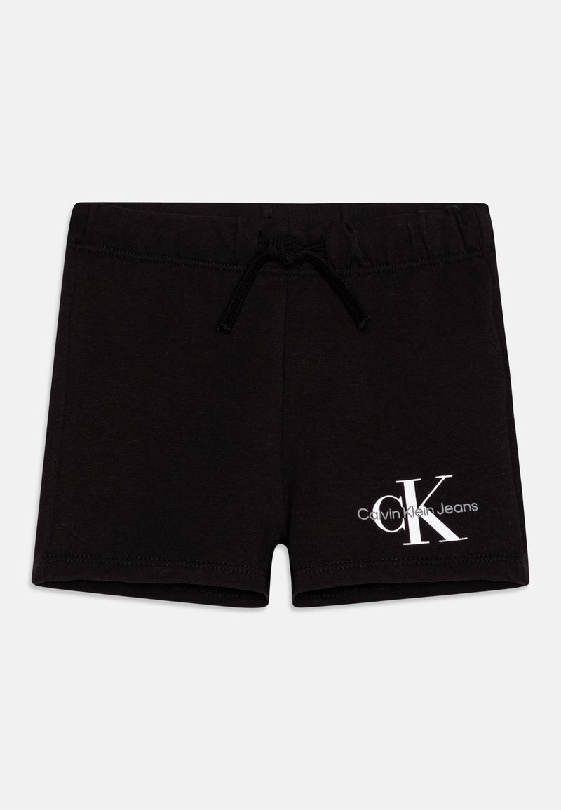 Čierne bavlnené šortky s elastickým pásom na šnúrku a bielym logom "CK" so textom "Calvin Klein Jeans" na dolnej ľavej strane.