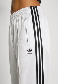 adidas Originals PANTS - Calças de fato de treino - matte silver