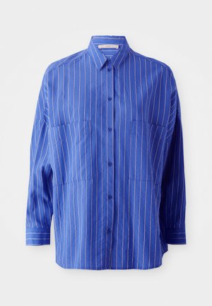 Blue button-up shirt with white stripes, featuring a collar, long sleeves, and two front pockets. Smooth fabric with a slightly loose fit.