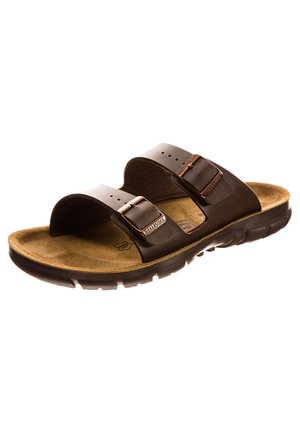 Sandali in pelle marrone con due cinturini regolabili, soletta testurizzata e suola imbottita. Presenta accessori in bronzo.