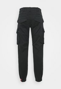 Schwarze Cargo-Hosen mit lockerem Schnitt, elastischen Bündchen und mehreren großen Taschen an den Seiten und hinten. Hergestellt aus strapazierfähigem Stoff.