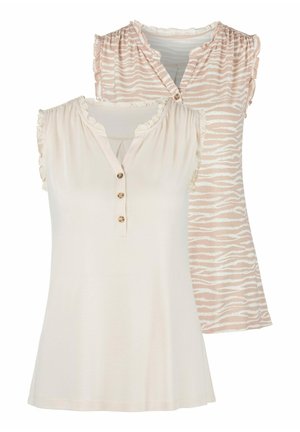 Zwei Damenoberteile: eines in einfarbigem Creme mit rüschengeschmückten Ärmeln und drei Knöpfen, das andere in zartem Rosa mit einem Zebramuster.