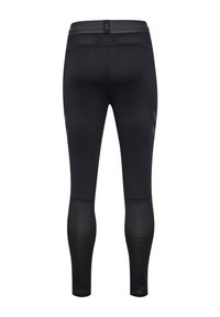 Leggings atléticos negros con un diseño elegante, que cuentan con un panel de malla en la parte inferior de las piernas y sutiles acentos de marca a los lados.