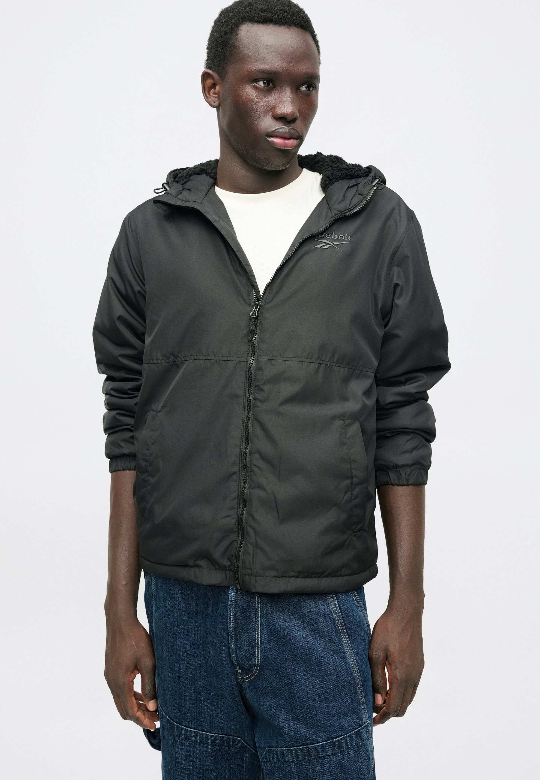 Reebok WINDBREAKER LIGHTWEIGHT FULL ZIP - Light jacket - black