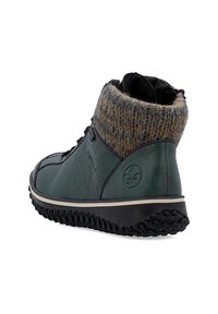 Groene leren enkellaars met een gebreide grijze en bruine omslag. Voorzien van een gestructureerde zwarte rubberen zool en een logodetail aan de zijkant.