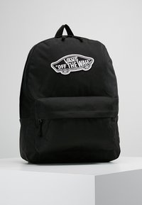 Zaino nero in tessuto, con una tasca frontale con zipper e un logo ricamato Vans "Off the Wall" in bianco.