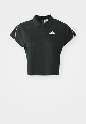 Black cropped polo shirt with short sleeves, featuring a textured fabric, three-button placket, and white logo accents on the chest and shoulder.