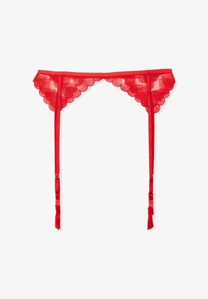 Czerwona koronkowa podwiązka z falistymi brzegami, zaprojektowana z regulowanymi paskami i gładką teksturą. Posiada metalowe zapięcia do mocowania.