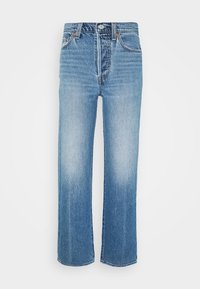 Ljusblå denimjeans med hög midja, vid bendesign, blekt utseende, klassisk femficksstil och knäppning med knapp.