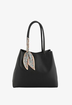 Sac fourre-tout en cuir noir avec deux bretelles, décoré d'un foulard à motif floral noué sur une bretelle.