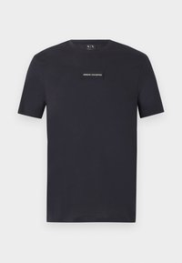 Μαύρο κοντομάνικο T-shirt με στρογγυλή λαιμόκοψη και την επιγραφή "Armani Exchange" στη μέση του στήθους.
