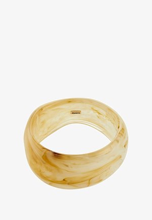 Translucent marbled resin bangle in shades of cream and light brown, featuring a smooth, curved design with polished edges and subtle shine.
