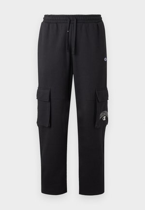 Schwarze Cargo-Hosen aus weichem Material, mit zwei Seitentaschen, einem elastischen Bund und einem Logodetail am linken Bein.