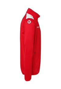 Red zip-up jacket with white accents, featuring a high collar, long sleeves, and a side zipper pocket. Smooth fabric texture.