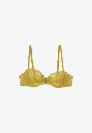 Soutien-gorge en dentelle jaune avec armatures, doté de bretelles réglables et d'une fermeture à l'avant, présenté sur un fond blanc.