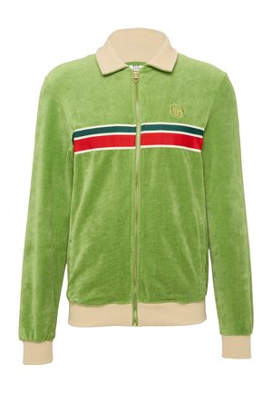 Grön velour zip-up jacka med krämfärgad ribbad krage och manschetter, med ett horisontellt röd- och blåstrimmigt mönster över bröstet. Guld logotypdetalj.