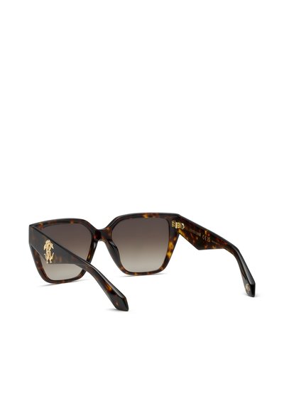 Lunettes de soleil carrées surdimensionnées à motif écaille, verres dégradés foncés et logo décoratif doré sur les branches.