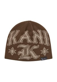 Barna kötött sapka, nagy bézs színű "KANI" felirattal és díszes csillagmintákkal. Fekete címkével rendelkezik, amely az aláírás részleteit tartalmazza.